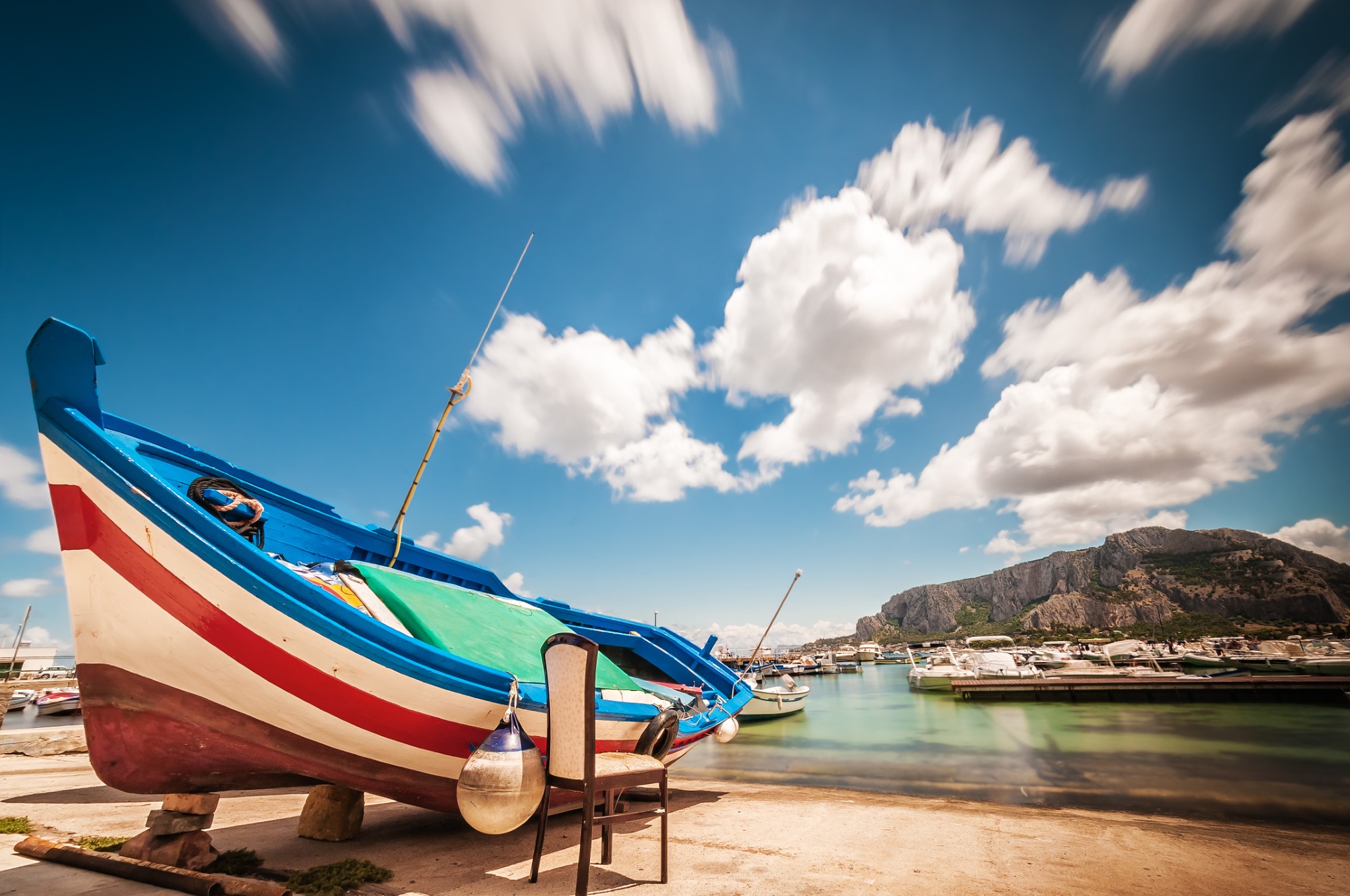 A small fishing boat in a port in Sicily (Italy)